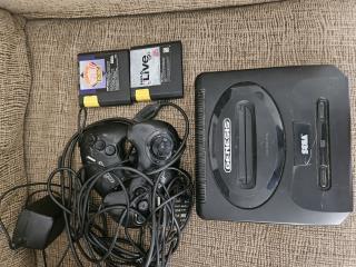 Sega genesis antiguo con 2 casettes