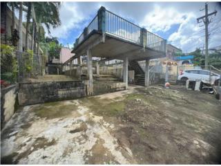Solar con estructura en pueblo de Ciales