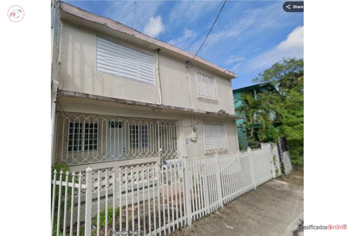 Two-story house with two adjoining casitas