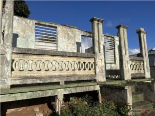 Solar con casa para remodelar en Arro...