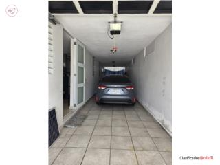 MODERNA, REMODELADA Y CON GARAJE PARA...