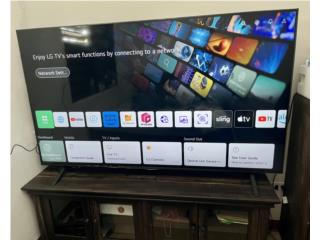 Televisor 75’ nuevo con rack en madera