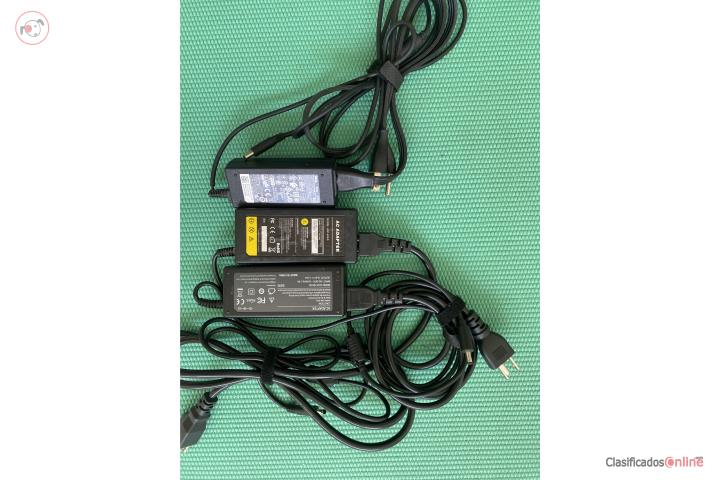 Tres laptop chargers (AC adapter), Puerto Rico