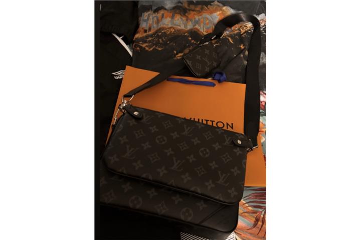 Cartera de hombre lv solamente se usó una vez