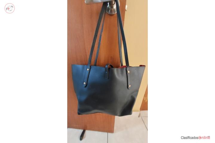 Cartera de color negra marca coach, Puerto Rico