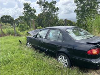 Toyota Puerto Rico Corolla 2001 chocado. Titulo en mano
