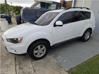 Mitsubishi Puerto Rico outlander 4 cilindro linda y poco milage