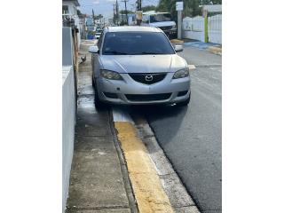 Mazda Puerto Rico Es un carro 4 puerta prende & todo 