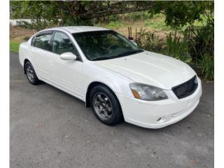 Nissan Puerto Rico Aire marbete excelente de motor y transmisin