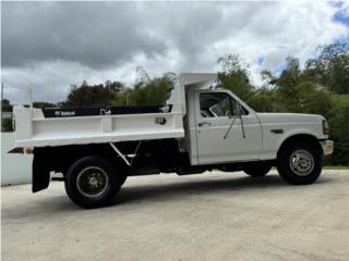 Equipo Construccion Puerto Rico F350 tumba 1995 