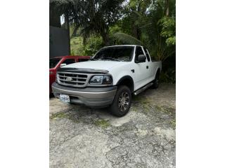 Ford Puerto Rico Ford 4x4 2002 poco millaje $13,000