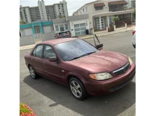 Mazda 2003 automático aire y marbete al dia