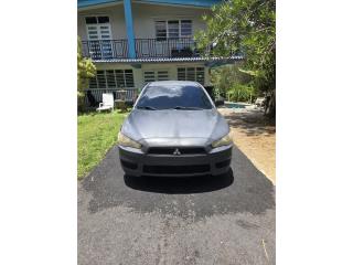 Mitsubishi Puerto Rico Vendo lancer 2010 por viaje a 4,0000 OMO