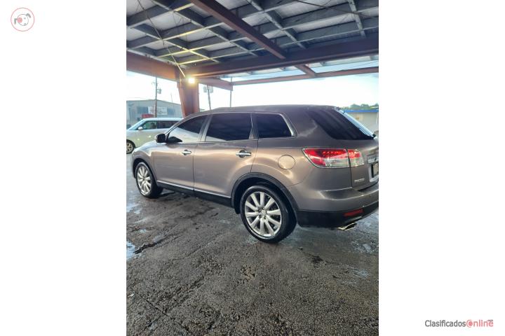 Cx-9 touring 2009 un solo dueño
