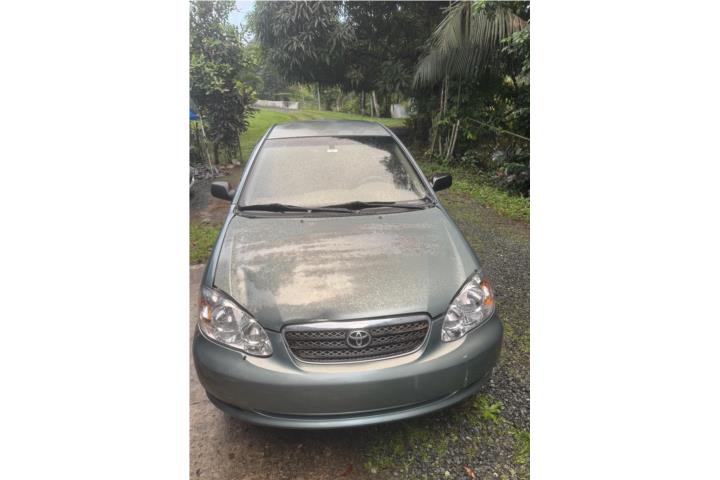 Toyota Corolla 2006, con 80670 millas