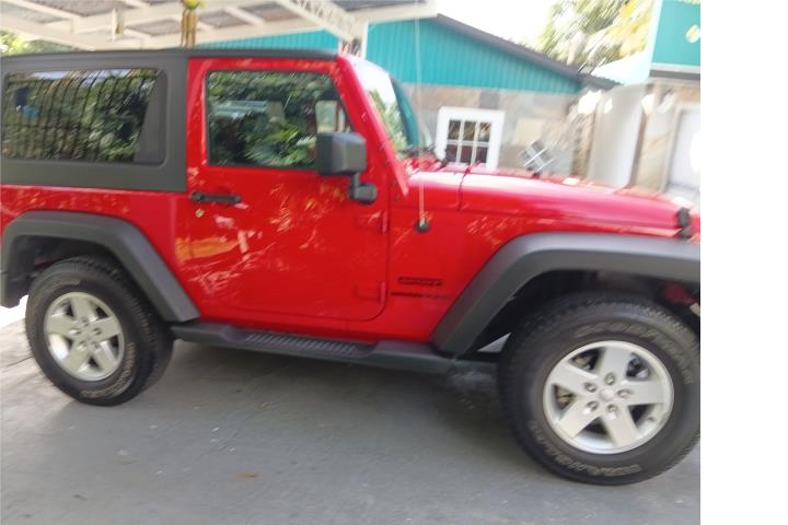 Jeep sólo 12,100 millas
