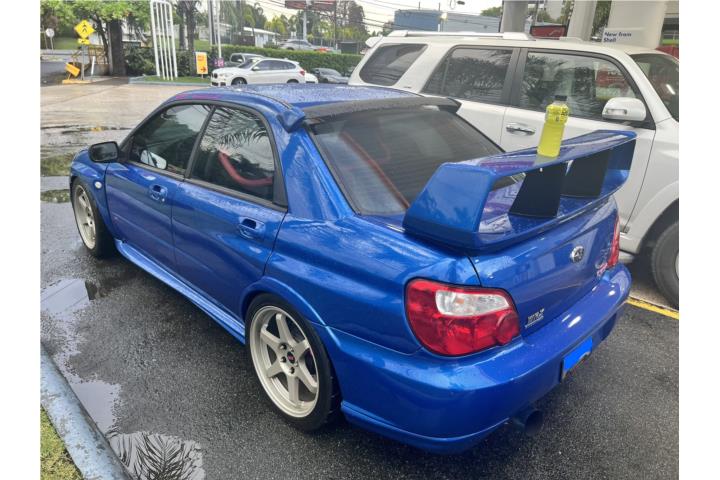 Subaru STI-25k-Equipado (Azul/Aros Dorados)