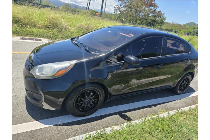 Kia rio 2015 buenas condicionea de pintura y
