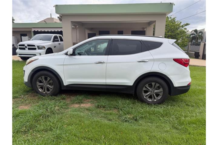 Hyundai Santa fe 2014 $14,000. En e