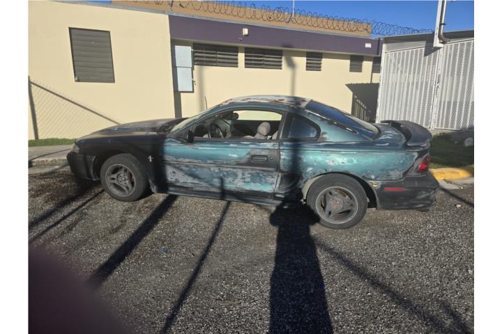 Sevende Ford Mustang del 97 seis silindros 15