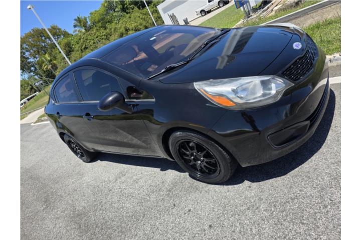 Kia rio 2015 buenas condiciones aire marbete