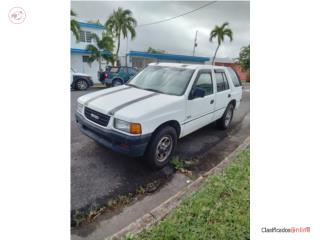 Isuzu Puerto Rico Vendo o negoceo por motora Isuzu rodeo std ni
