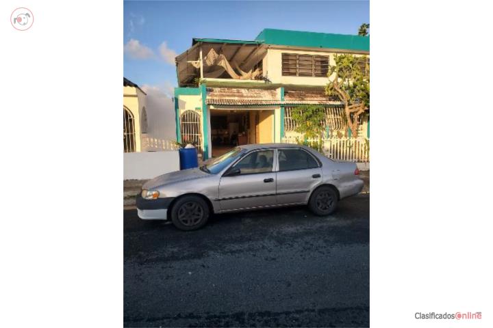 Toyota corolla 2002 marbete y aire 2,600 OMO