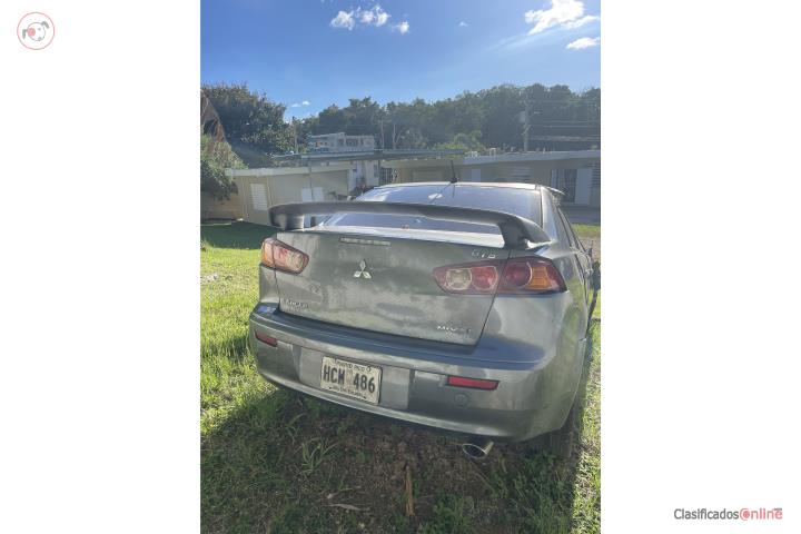 Mitsubishi Lancer 2008 chocado $2,000.