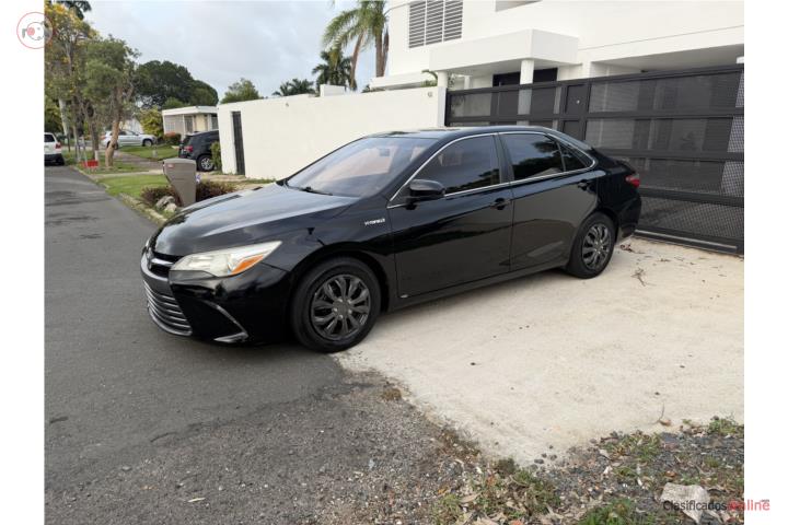Camry LE Hibryd Título en Mano Venta Por Due!
