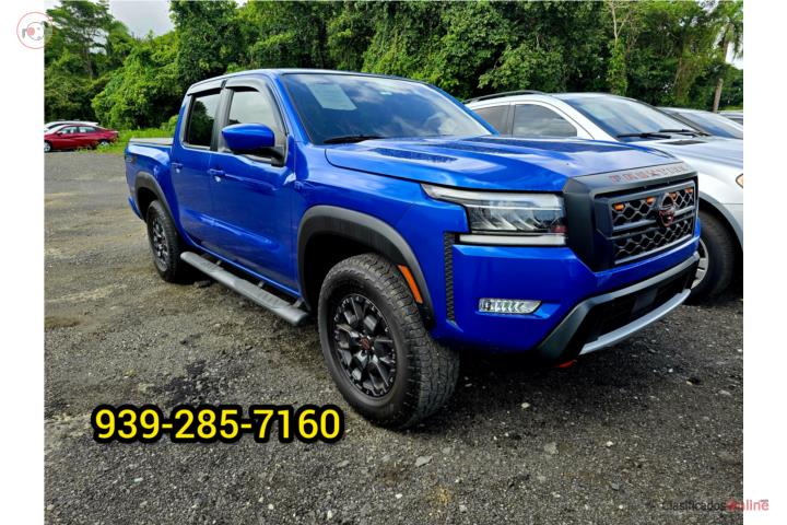 PRO-4X ESTRIBOS, BED COVER, VENT VISORS Y MAS
