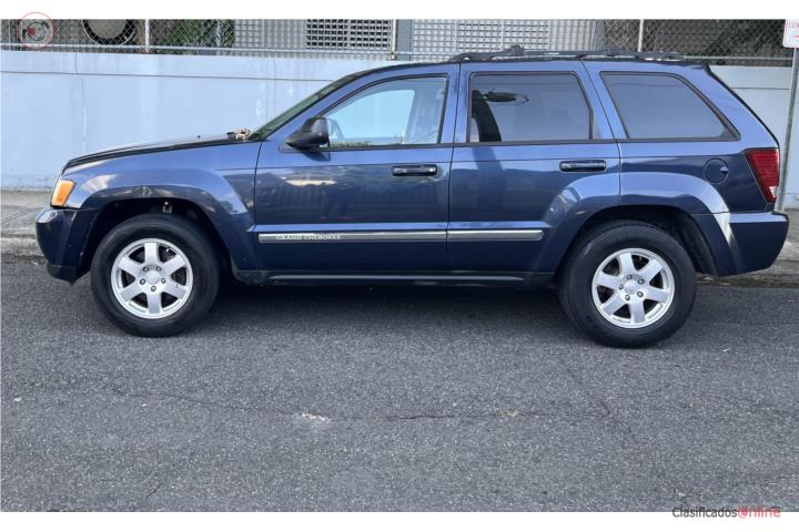 Jeep gran Cherokee Laredo 2010$5695