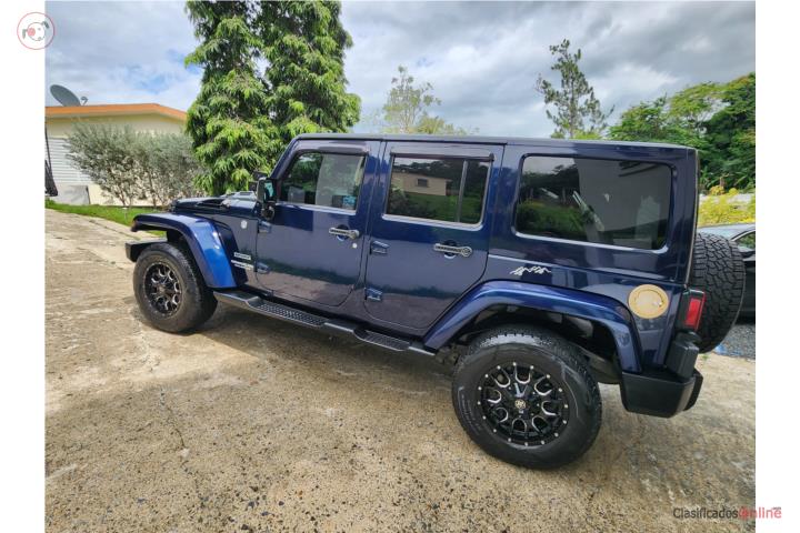Jeep Wragler 2013 ($13,800)Poquito Millage Á