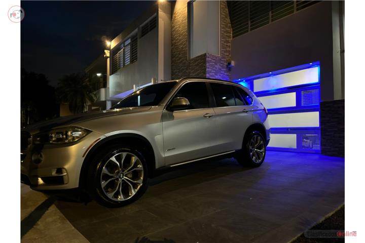 Bmw X5 35i 2014 millares 150.000 $12,000