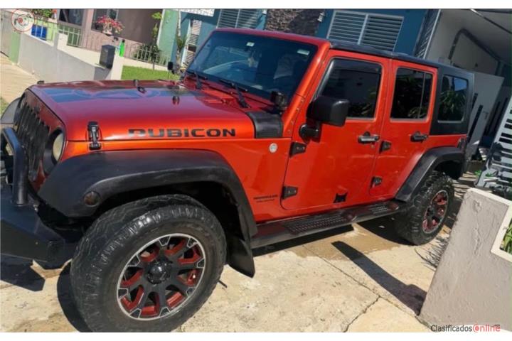 Jeep rubicon 2009 $18,000 aros 134 mil millas