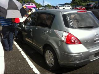 Compuerta Nissan versa 2012