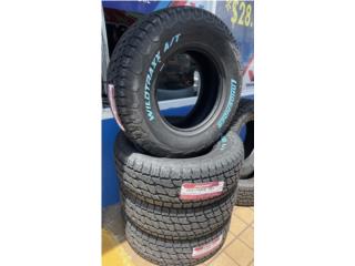 GOMAS NUEVAS 265/70/R16  LETRAS BLANCAS AT  Puerto Rico S.R. Battery & Tire LLC