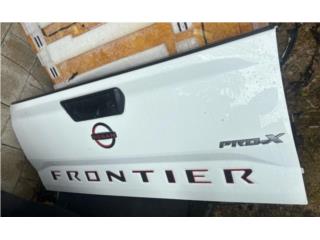 Compuerta Nissan frontier 23-26 Puerto Rico ALLISON BODY PARTS
