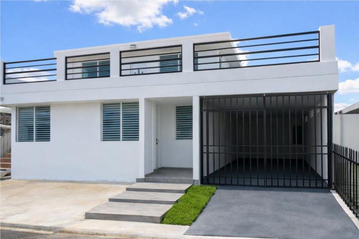 Urbanizacion-Alturas De Flamboyan Casa bajos,control acceso agua y luz aire máster Casa en Bayamón