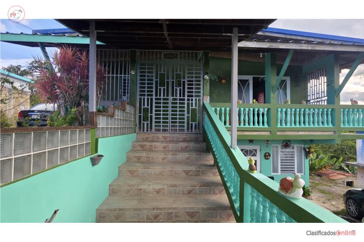 Amplia residencia con agua y luz incluída