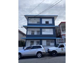 EDIFICIO DE APARTAMENTOS SANTURCE 