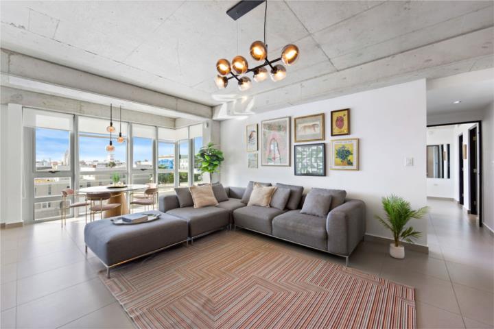 Live the Vibe: Step into this modern-chic 2-bedroom, 2-bathroom loft-style residence at Atlantis, wh