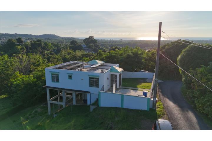 Discover a peaceful mountain-style home just minutes from the center of Rincón, Puerto Rico—known as