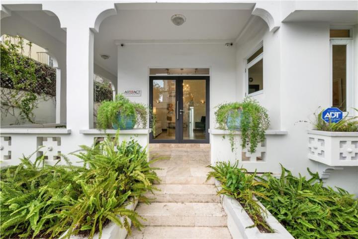 This reimagined 1940s Spanish Revival estate in Condado offers an exceptional blend of luxury, versa