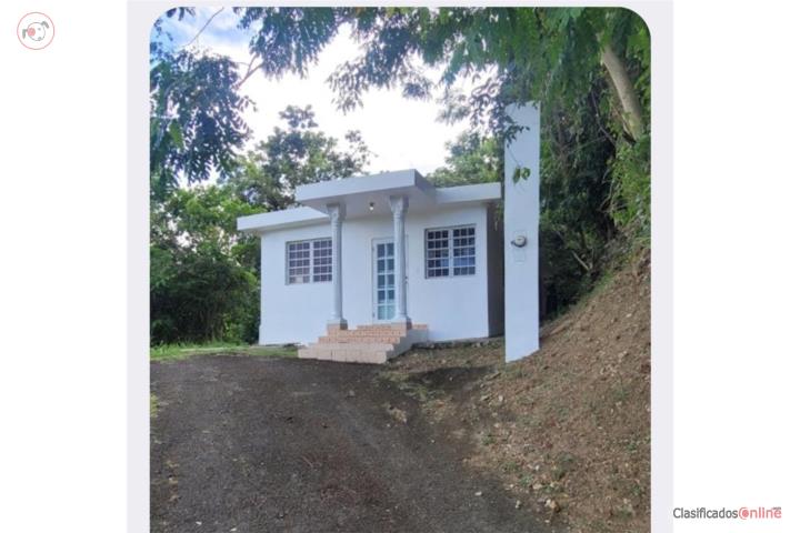 Casa con 1 cuerda y 1/2 de terreno!