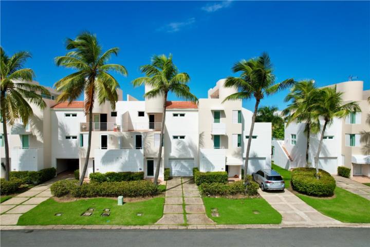 Impressive four-level residence located in an exclusive gated community within Dorado Del Mar.