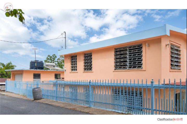 CASA CON PLACAS SOLARES Y CASITA EN UTUADO
