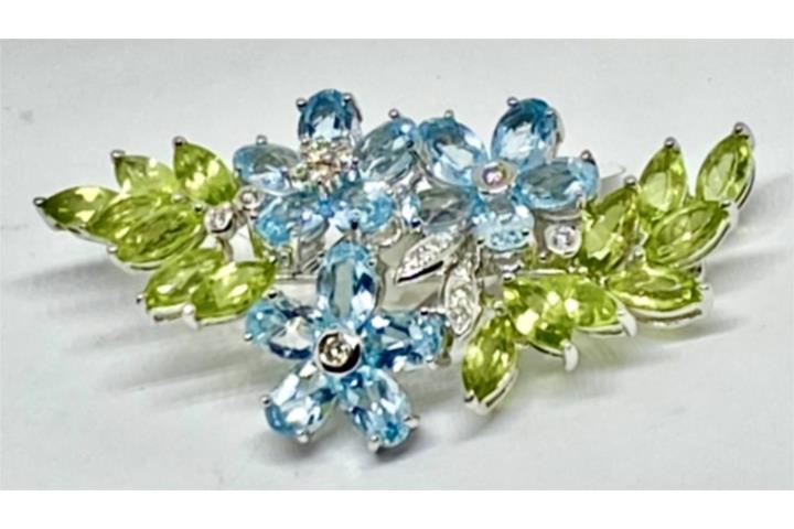 PRENDEDOR AQUAMARINAS 18KT