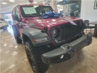 Jeep Puerto Rico IMPORT 2DR ROSITA OSCURO 4X4 V6 AROS NEGROS