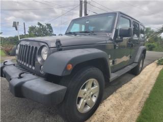 Jeep Puerto Rico SPORT UNLIMITED JK V6 4X4 GRIS OSC DESDE 299!