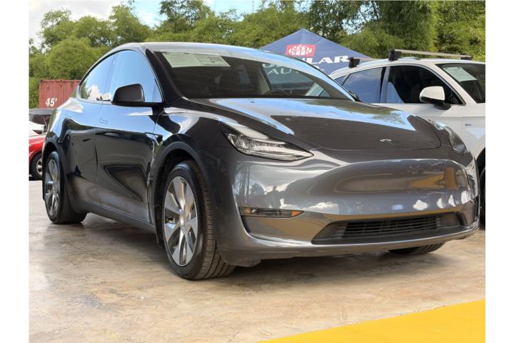 2021 Tesla Model Y Long Range  19,314 millas